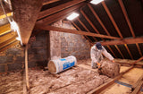 Person installing Knauf Loft Roll 44