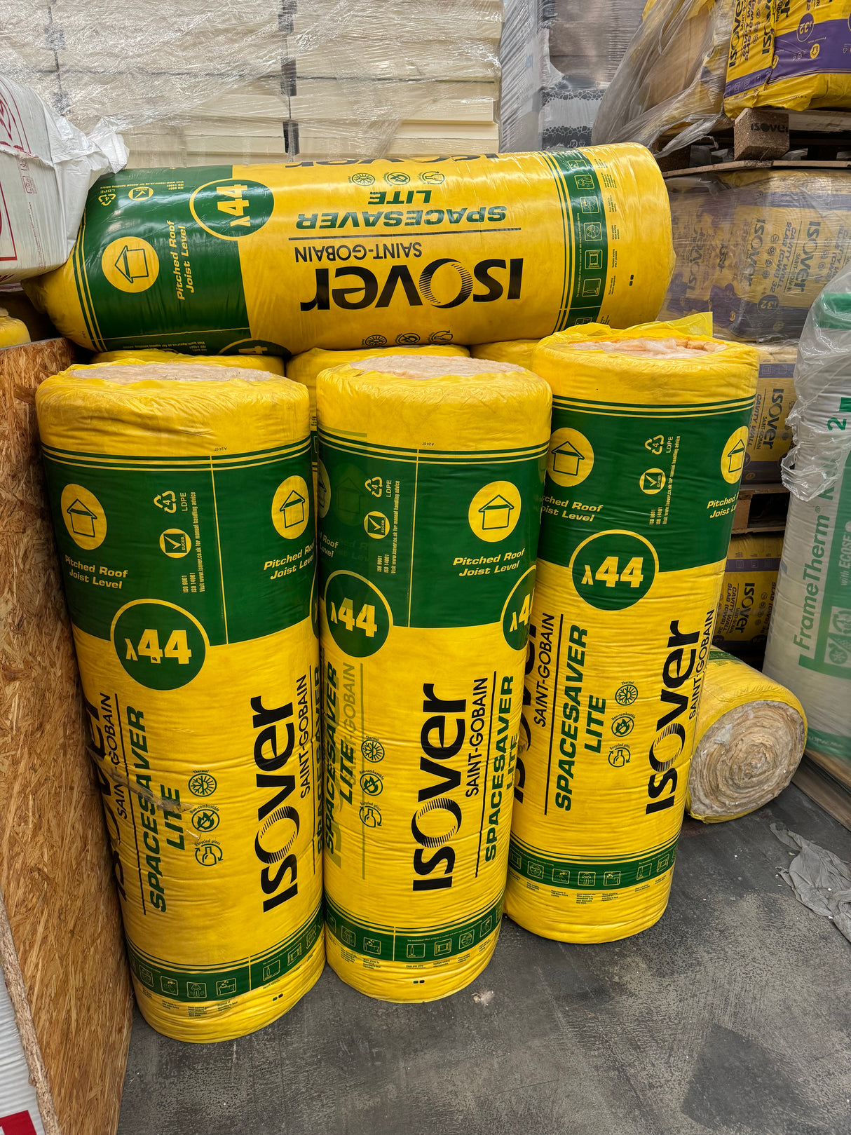 Rolls of Isover Spacesaver Lite displayed in a warehouse